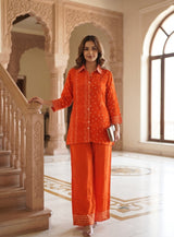 Front view of Orange Muslin Bandhani Print Shirt from Kunvarani