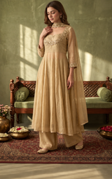 Woman wearing Gold Tissue Zardosi Work IndoWestern Dress | Kunvarani