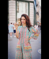 Woman wearing Coral coloured crepe Coord Set | Kunvarani