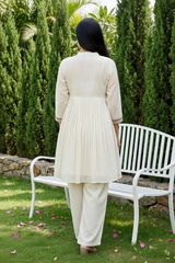 Woman wearing off White kurthi set | Kunvarani