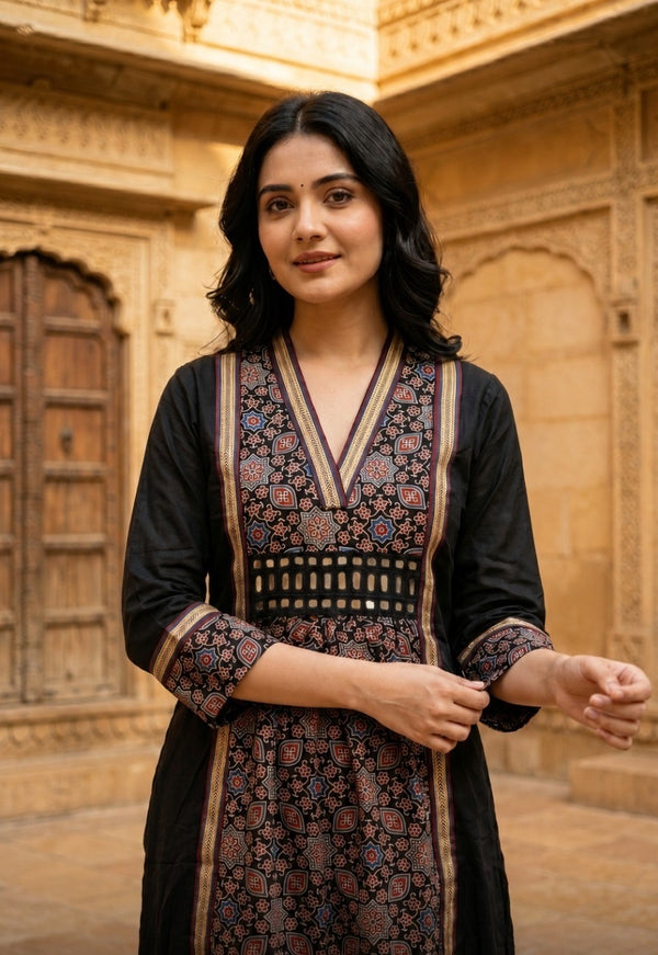Woman wearing Black Ajrakh print Dress with mirror work | Kunvarani