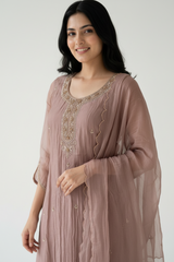 Fabric and detail close up of Baby Pink Tissue Beadwork Suit Set with Dupatta from Kunvarani