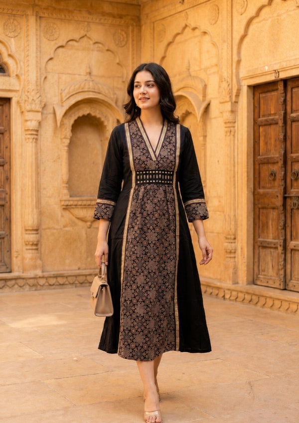 Woman wearing Black Ajrakh print Dress with mirror work | Kunvarani