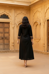 Woman wearing Black Ajrakh print Dress with mirror work | Kunvarani