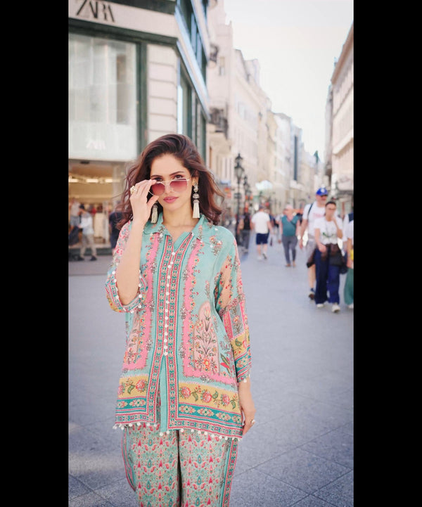 Woman wearing Coral coloured crepe Coord Set | Kunvarani