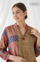 Woman wearing Crepe top with red stone tassle detail | Kunvarani