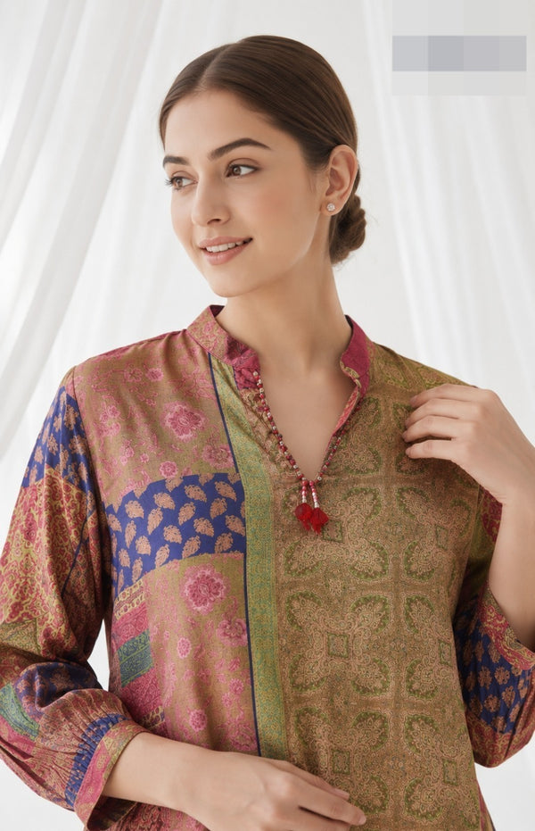 Woman wearing Crepe top with red stone tassle detail | Kunvarani