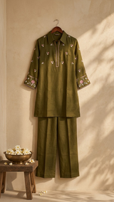 Woman wearing Olive Green Chanderi Cotton Embroidery Kurti Set | Kunvarani