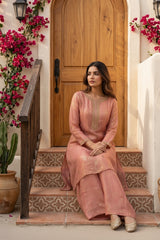 Woman wearing Peach Gold Tissue Pearl Work Kurti Set | Kunvarani