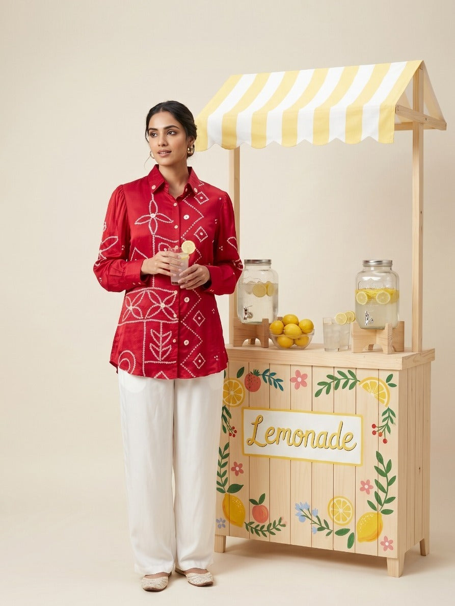 Woman wearing Hot Pink Crepe Bandhani Print Shirt | Kunvarani