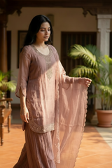 Woman wearing Baby Pink Tissue Beadwork Suit Set with Dupatta | Kunvarani